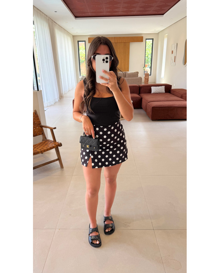 Jupe short à pois noir